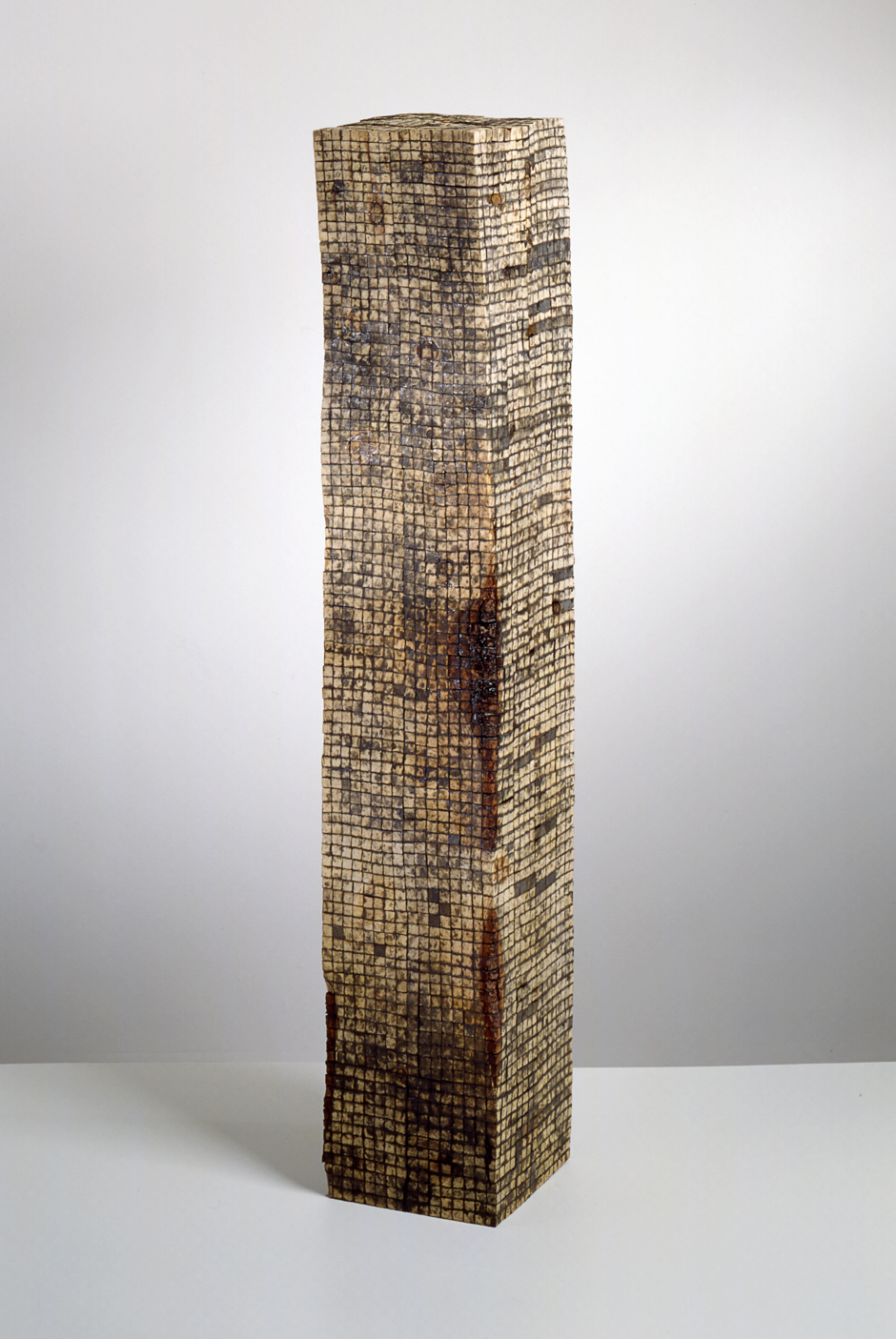 Image of floor standing "Cubed II" sculpture created from wood bandsawn and reassembled with graphite and epoxy