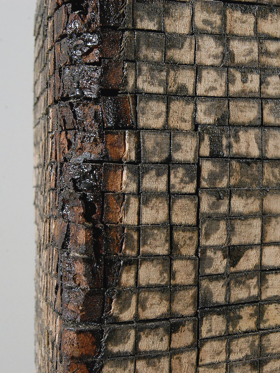 Detail image of floor standing "Cubed II" sculpture created from wood bandsawn and reassembled with graphite and epoxy