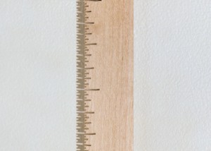 Detail image of wall hung "Measure IV" sculpture created from bandsawn wood