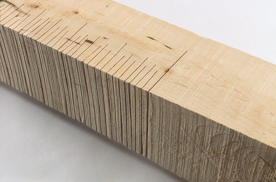 Detail image of floor standing "Measure XII" sculpture created from handsawn wood